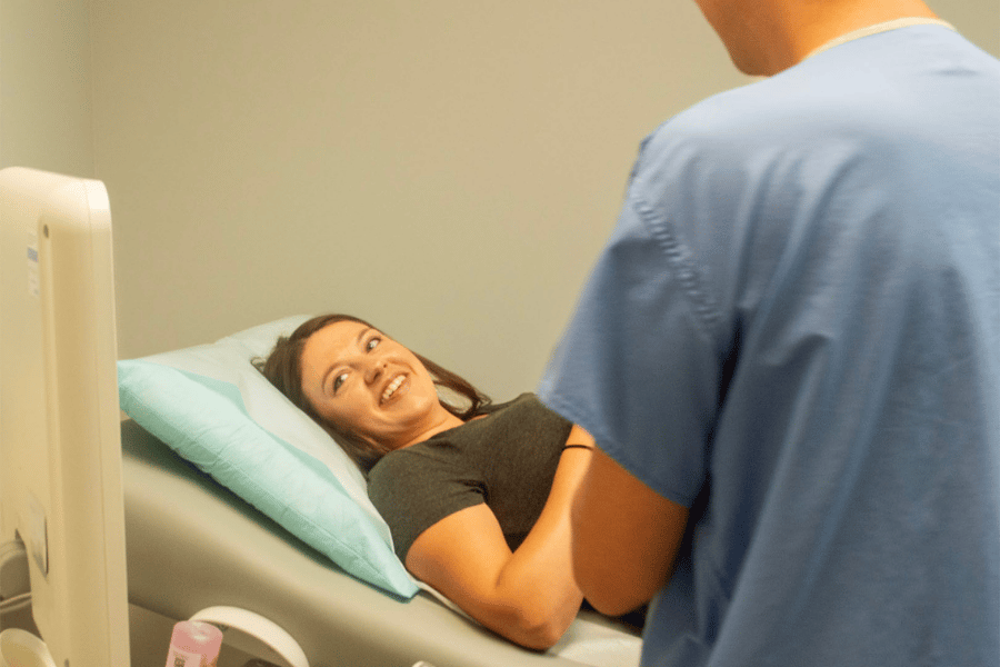 Dr. James doing an ultrasound on patient